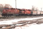 Grain train rolls west through University